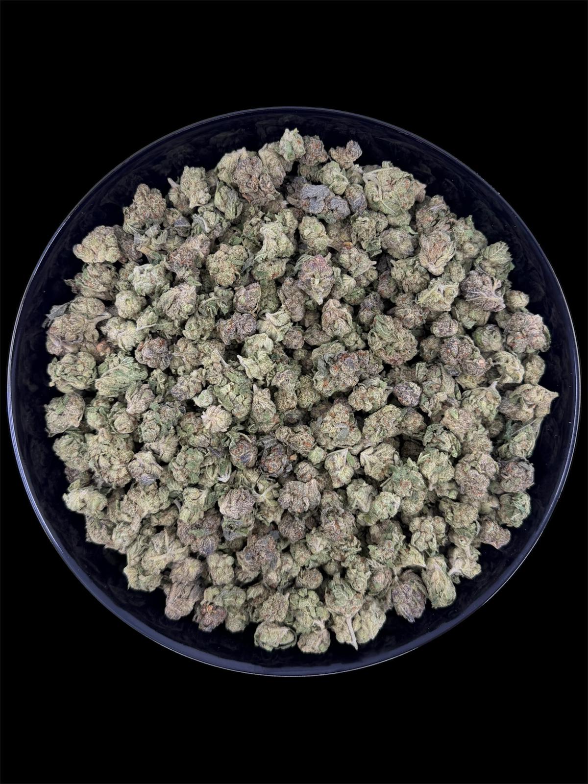 Nug-size THCA smalls in black tray – premium compliant flower.